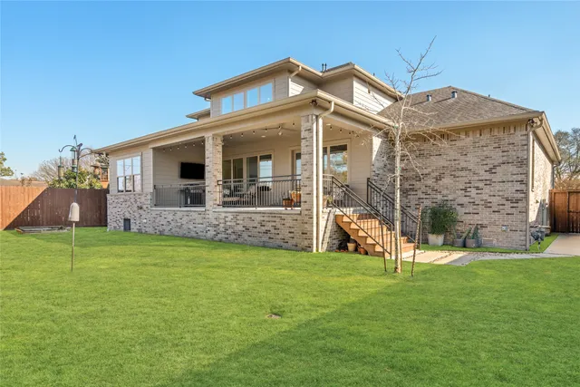 a view of a backyard with a garden and plants