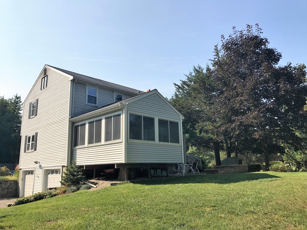 9 Green Valley Road Medway, MA 02053 - Photo 6 of 30 a front view of a house with a yard