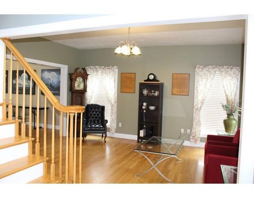 64 Middleboro Road Freetown, MA 02717 - Photo 14 of 30 a living room with furniture and a chandelier