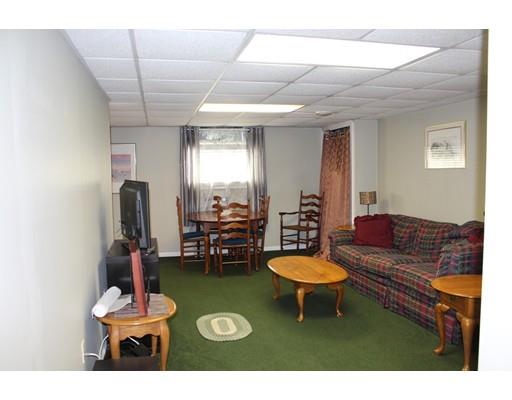 64 Middleboro Road Freetown, MA 02717 - Photo 22 of 30 a living room with furniture a rug and a window
