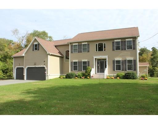 64 Middleboro Road Freetown, MA 02717 - Photo 27 of 30 a front view of a house with a garden and porch