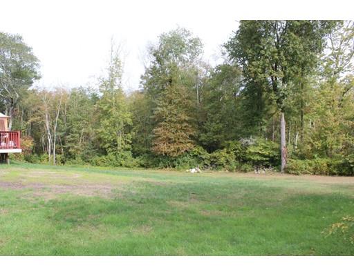 64 Middleboro Road Freetown, MA 02717 - Photo 30 of 30 a grassy field with trees in the background