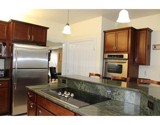 64 Middleboro Road Freetown, MA 02717 - Photo 7 of 30 a kitchen that has a sink cabinets and stainless steel appliances