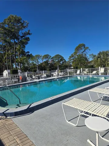 a view of a swimming pool and a terrace