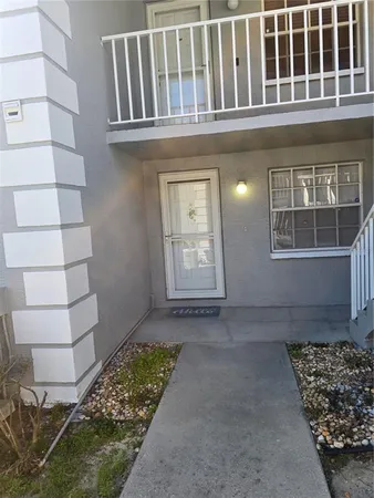 front view of a house with a small yard