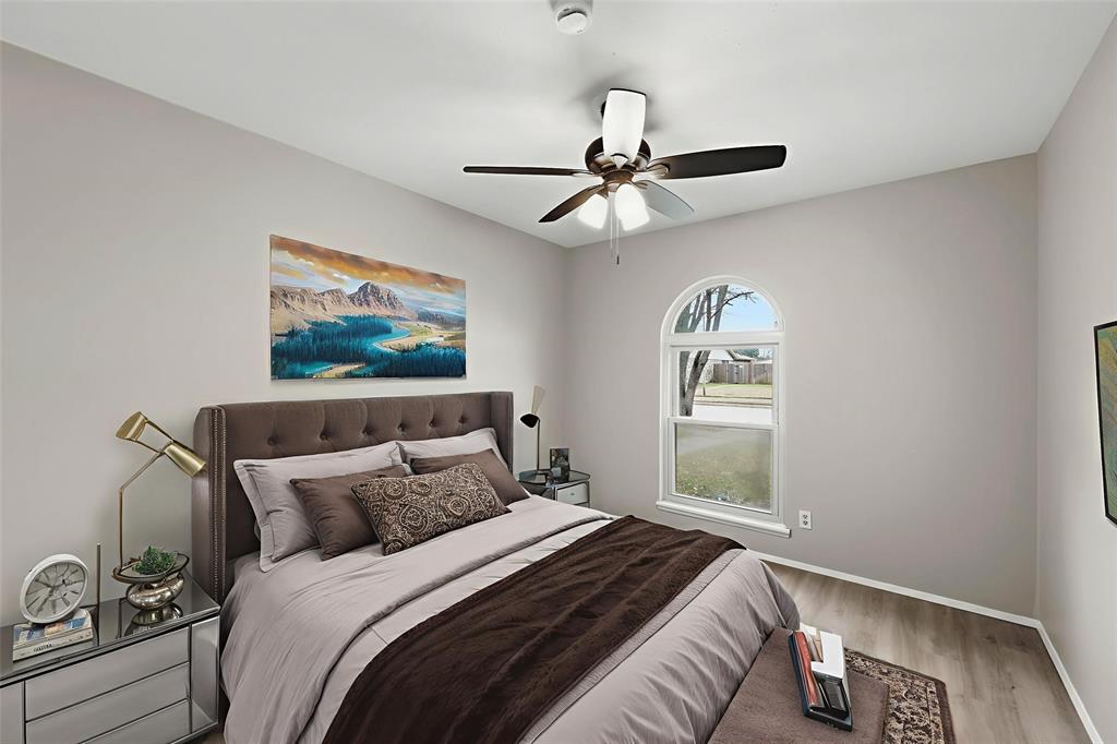 2102 Lewis Trail Grand Prairie, TX 75052 - Photo 17 of 33 a bedroom with a bed and a window