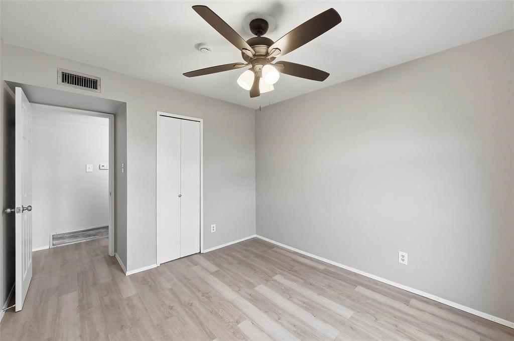 2102 Lewis Trail Grand Prairie, TX 75052 - Photo 18 of 33 wooden floor in an empty room