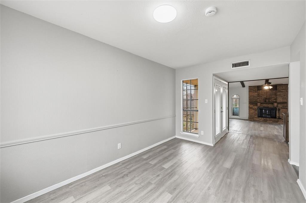 2102 Lewis Trail Grand Prairie, TX 75052 - Photo 7 of 33 a view of livingroom with furniture and wooden floor