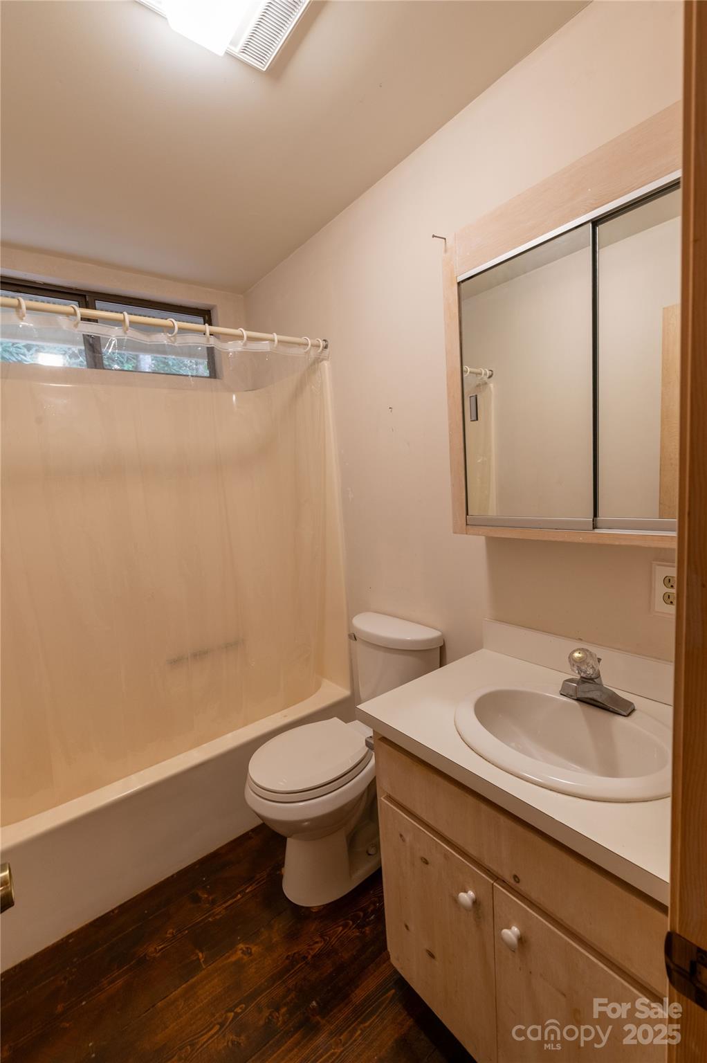 479 Big Ridge Road Burnsville, NC 28714 - Photo 17 of 40 a bathroom with a sink a toilet and shower