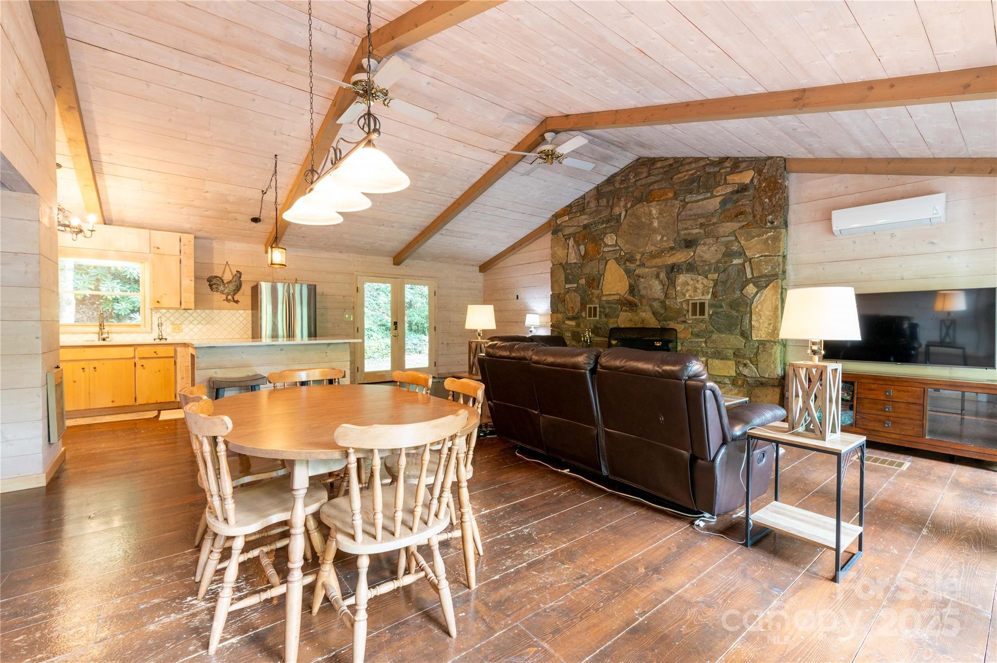 479 Big Ridge Road Burnsville, NC 28714 - Photo 5 of 40 a dining room with furniture and wooden floor
