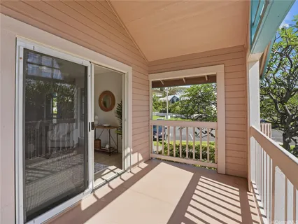 a porch with furniture and window
