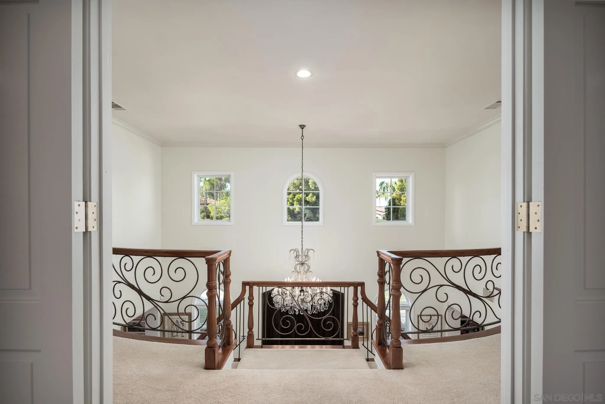 17323 Circa Del Sur Rancho Santa Fe, CA 92067 - Photo 20 of 41 a view of a hallway with a couch