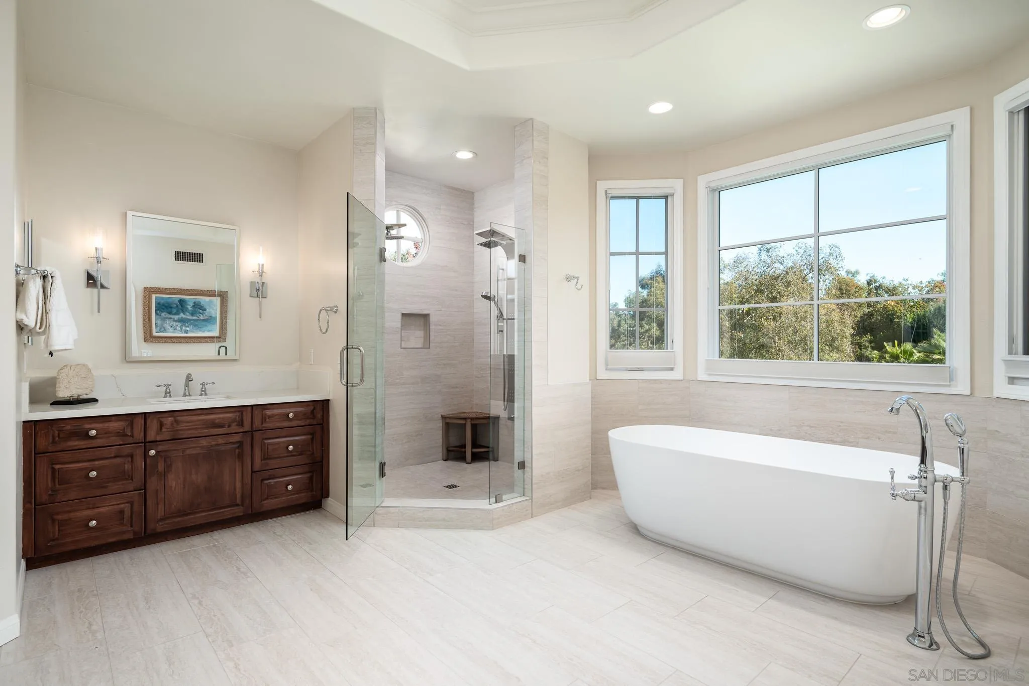17323 Circa Del Sur Rancho Santa Fe, CA 92067 - Photo 25 of 41 a spacious bathroom with a tub sink shower and mirror