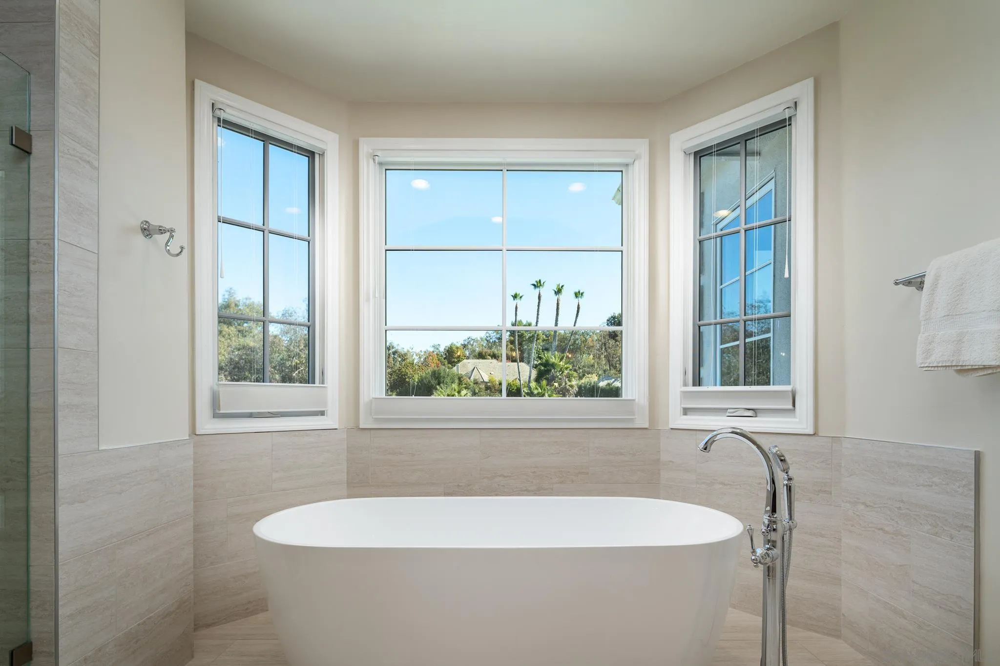 17323 Circa Del Sur Rancho Santa Fe, CA 92067 - Photo 26 of 41 a white bath tub sitting in a bathroom next to a window