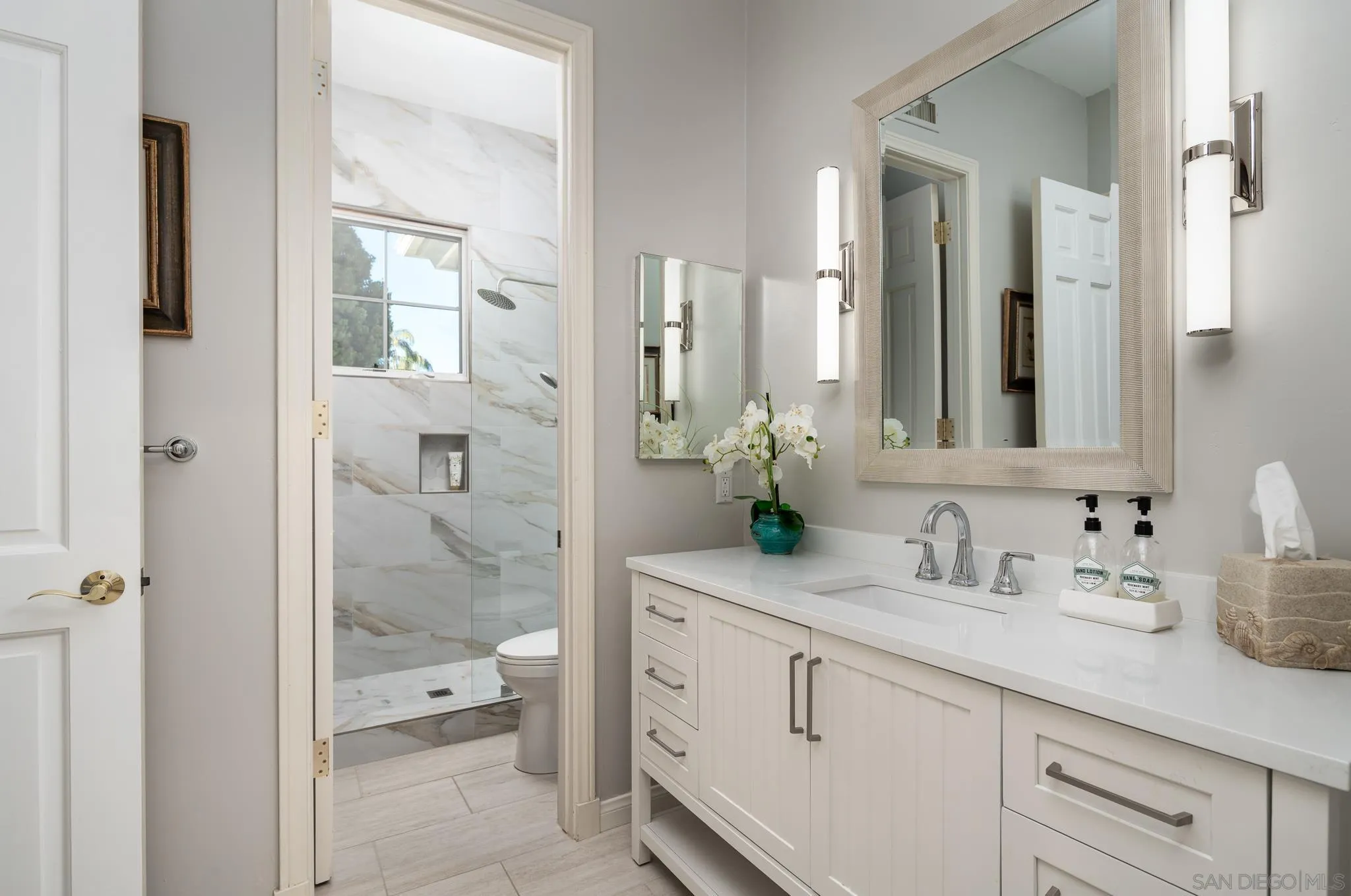 17323 Circa Del Sur Rancho Santa Fe, CA 92067 - Photo 29 of 41 a spacious bathroom with a granite countertop sink mirror and shower