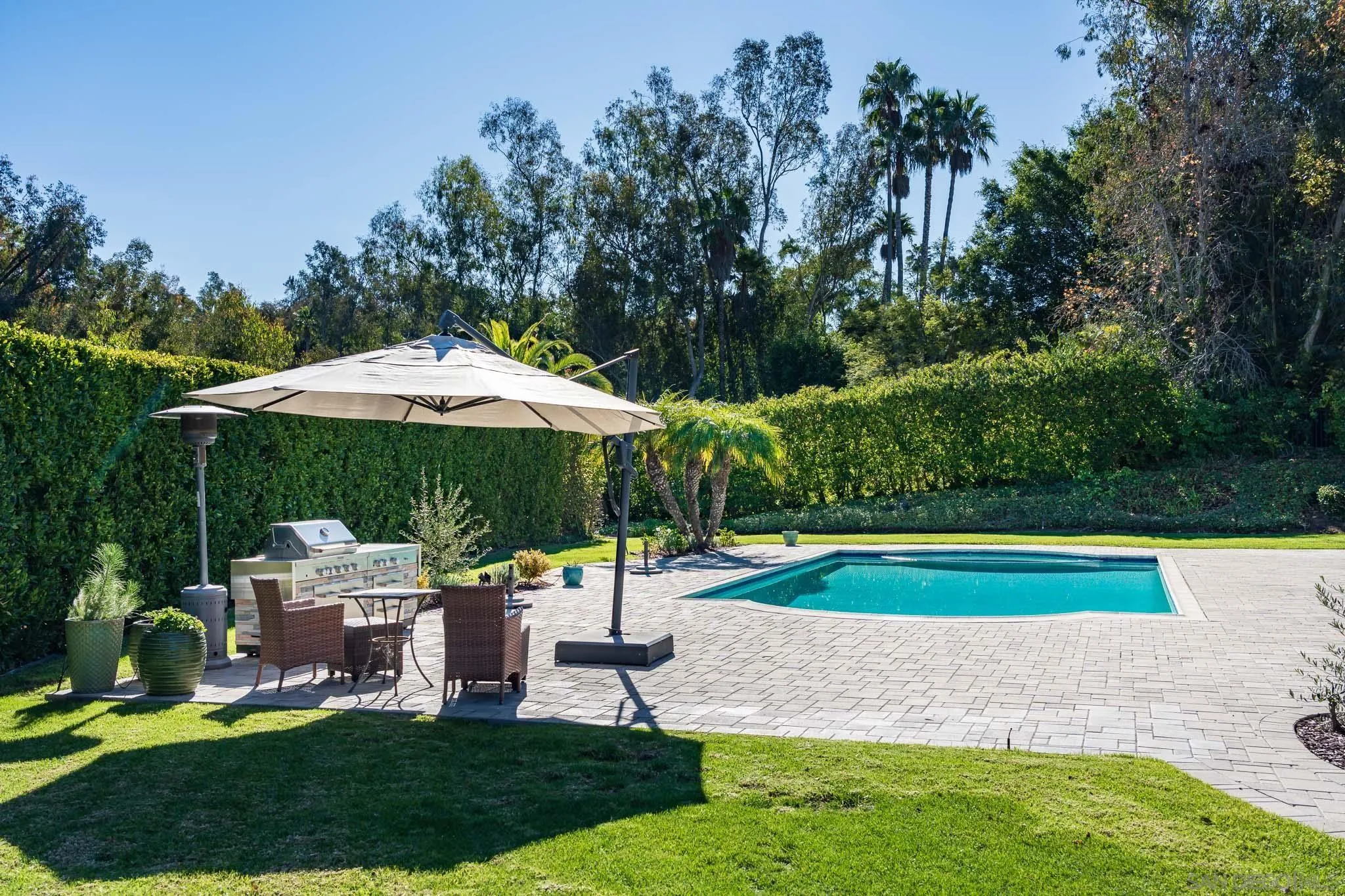 17323 Circa Del Sur Rancho Santa Fe, CA 92067 - Photo 34 of 41 a garden view with a seating space