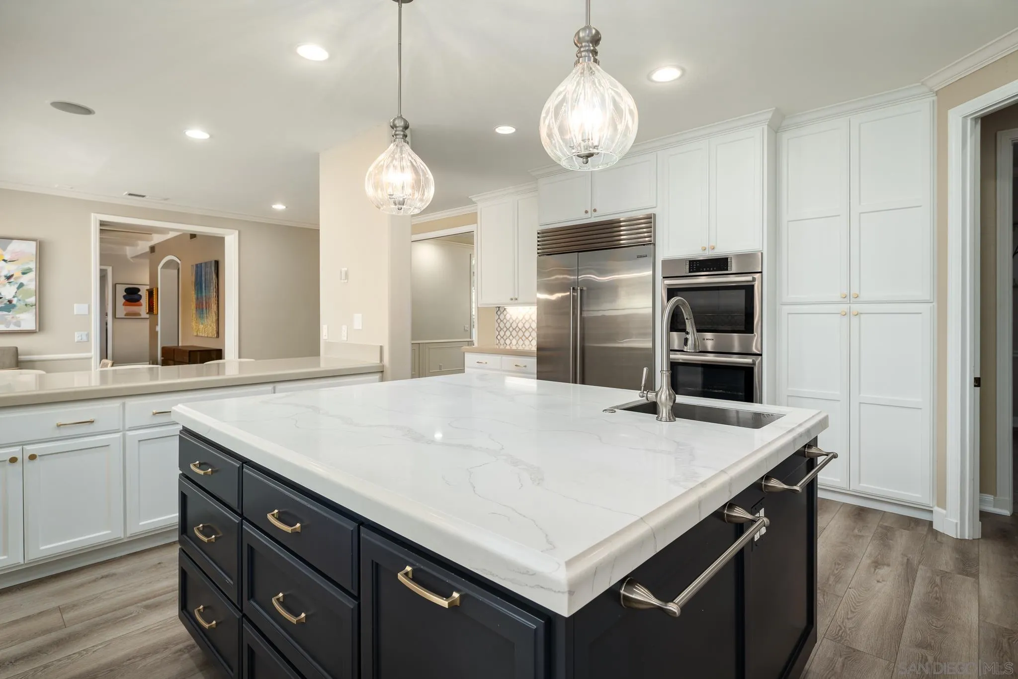 17323 Circa Del Sur Rancho Santa Fe, CA 92067 - Photo 10 of 41 a kitchen that has a cabinets a sink and stainless steel appliances