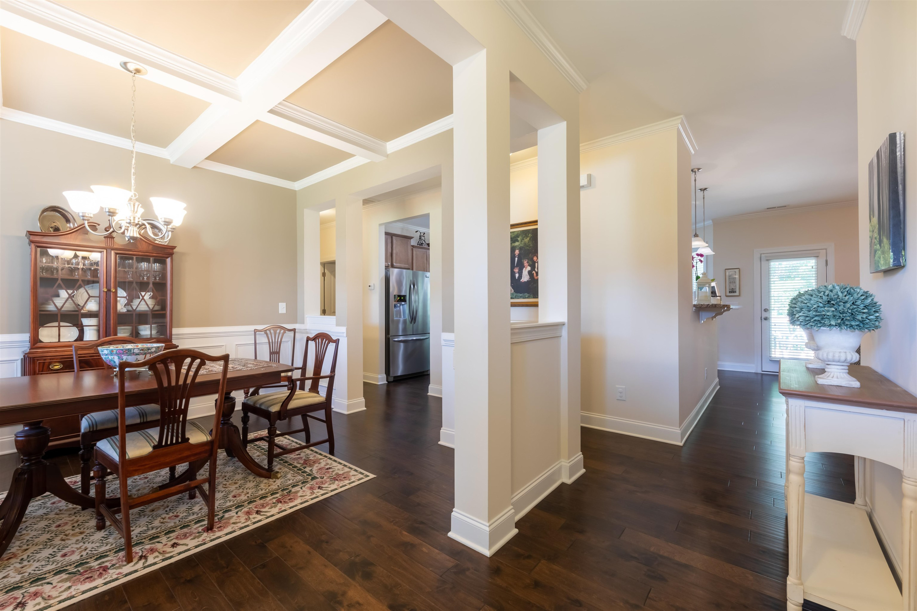 3537 Lavender Lane Wake Forest, NC 27587 - Photo 11 of 60 a view of a dining room with furniture and wooden floor