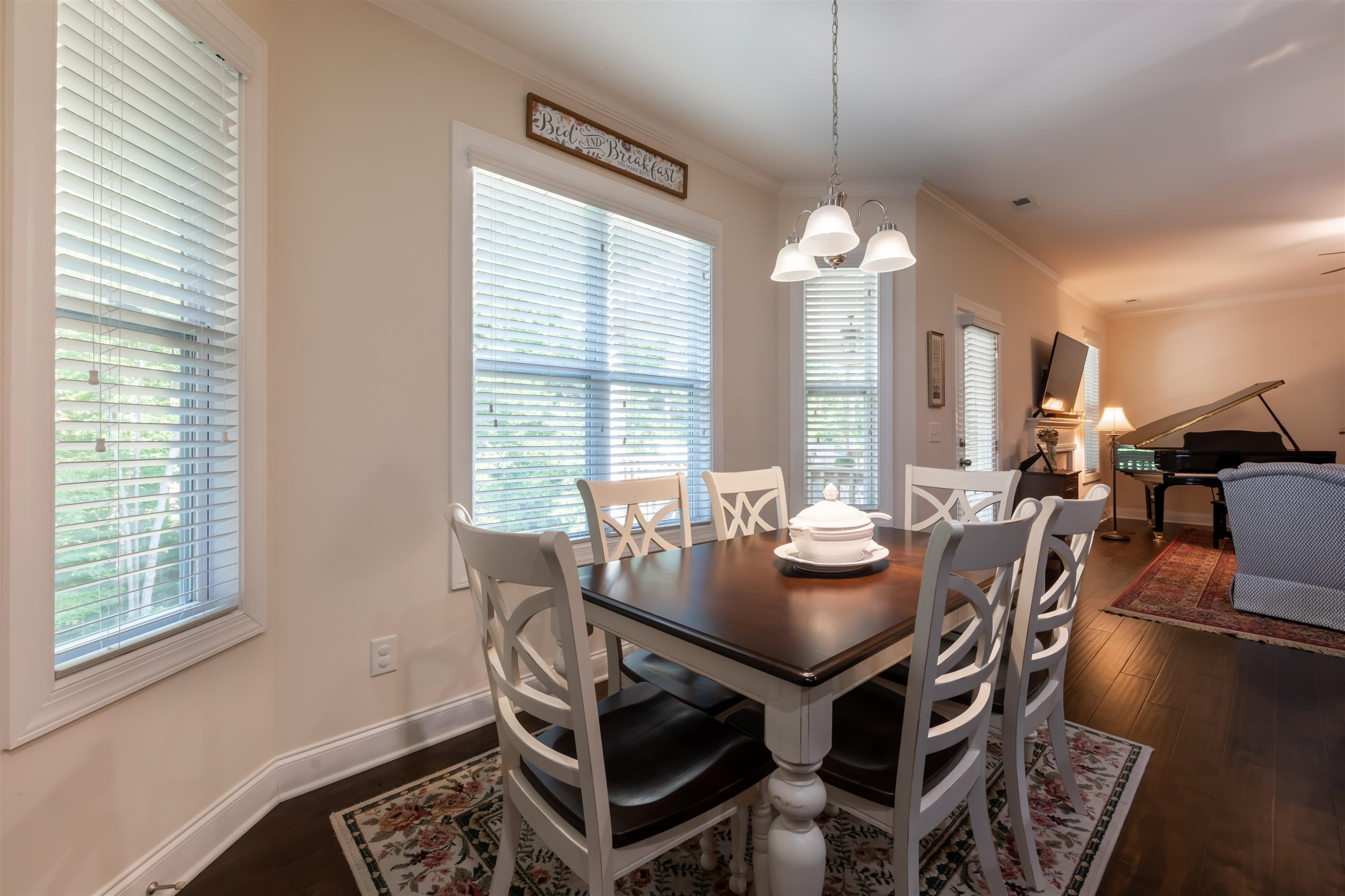 3537 Lavender Lane Wake Forest, NC 27587 - Photo 22 of 60 a view of a dining room with furniture window and wooden floor