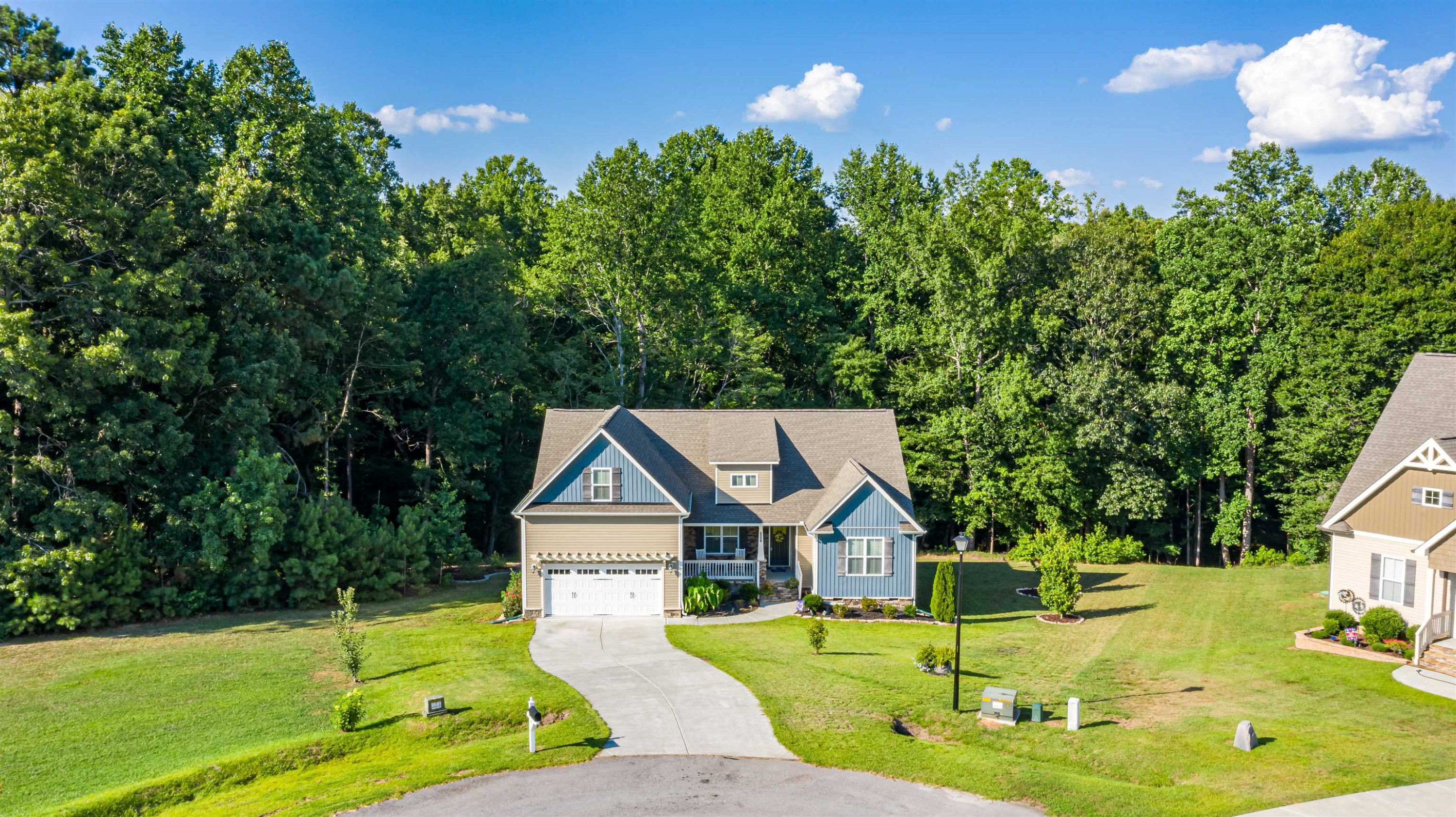 3537 Lavender Lane Wake Forest, NC 27587 - Photo 3 of 60 a front view of a house with garden