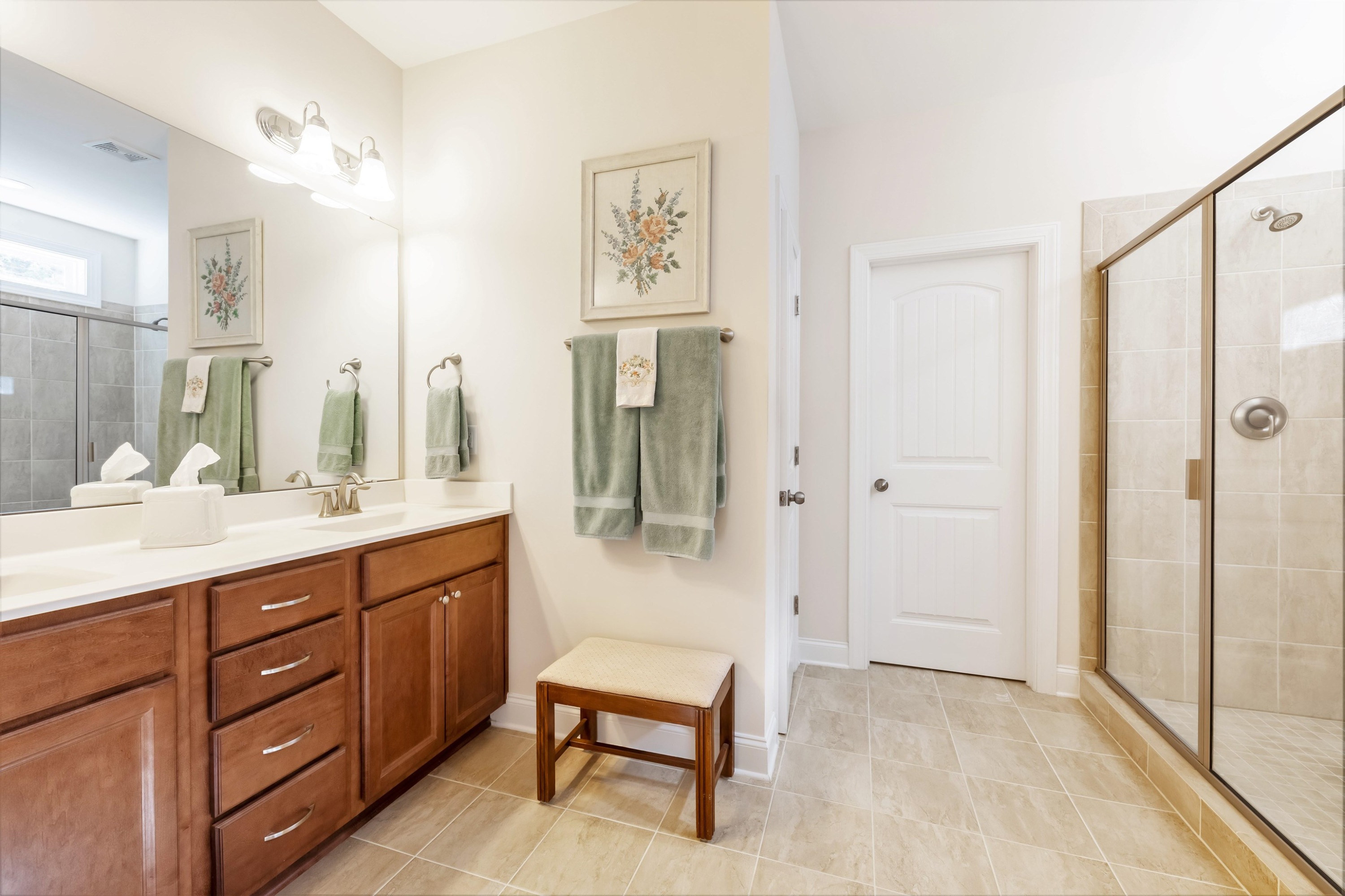 3537 Lavender Lane Wake Forest, NC 27587 - Photo 32 of 60 a spacious bathroom with a double vanity sink a mirror and a shower