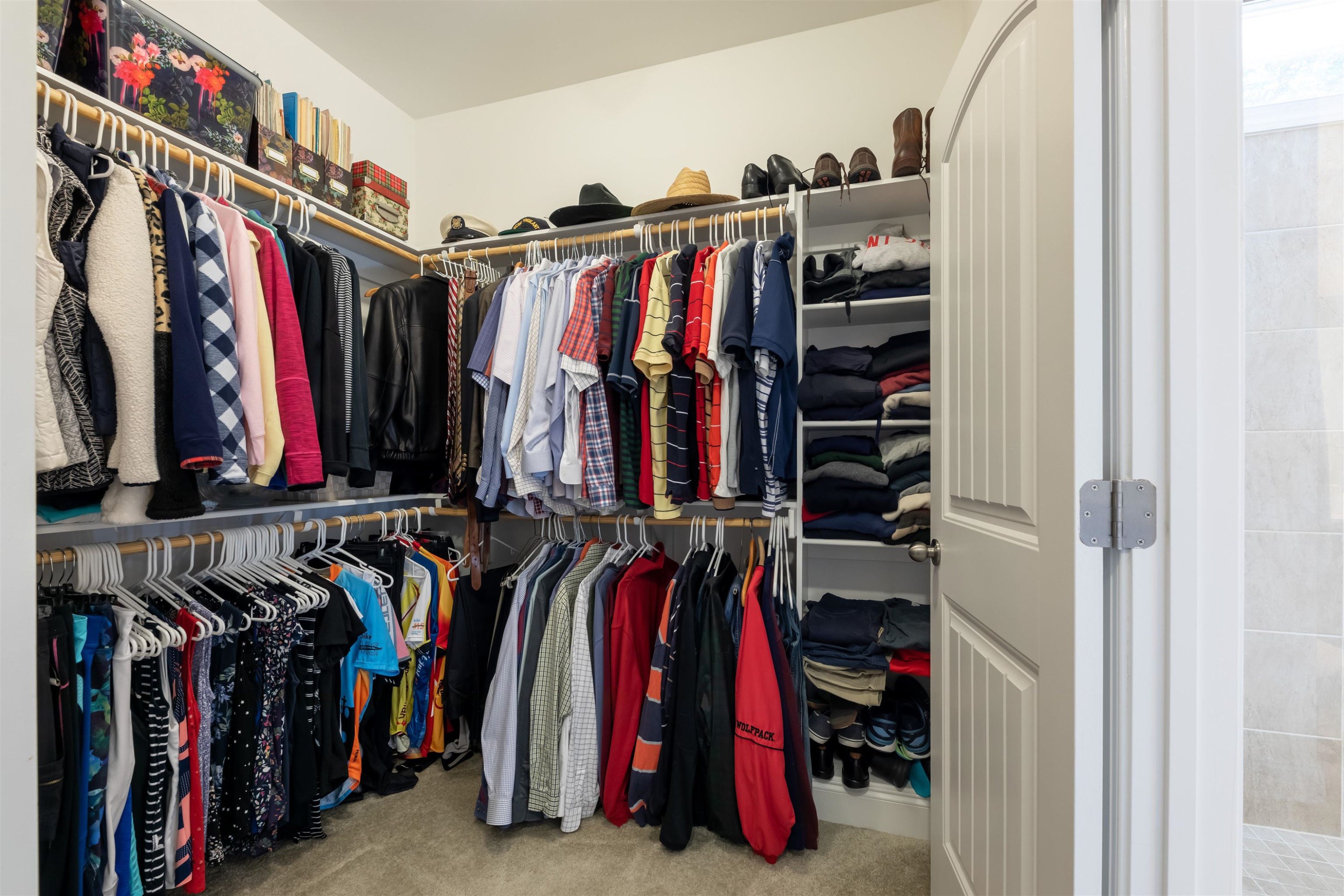 3537 Lavender Lane Wake Forest, NC 27587 - Photo 35 of 60 a view of walk in closet with clothes