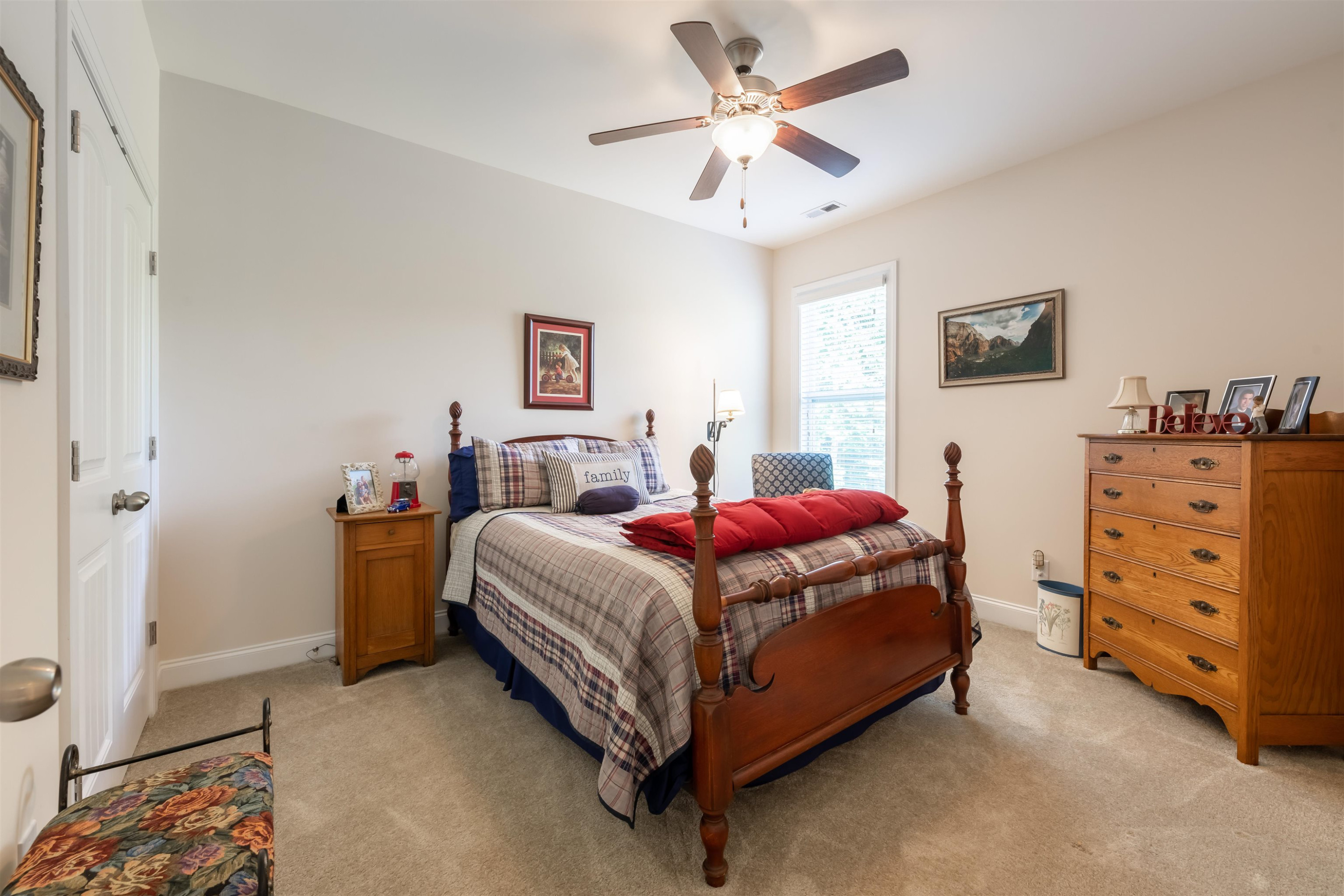 3537 Lavender Lane Wake Forest, NC 27587 - Photo 36 of 60 a spacious bedroom with a bed and a cabinets