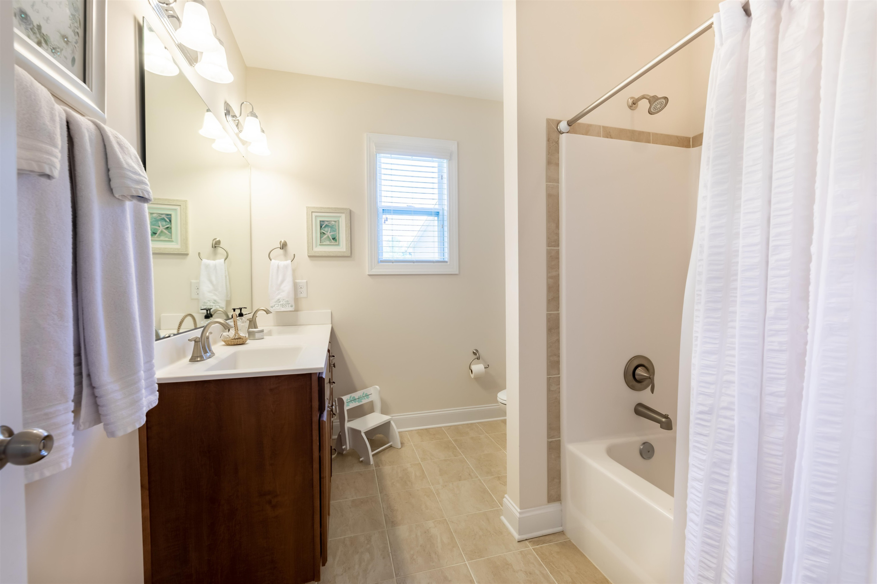 3537 Lavender Lane Wake Forest, NC 27587 - Photo 38 of 60 a bathroom with a bathtub shower sink and mirror