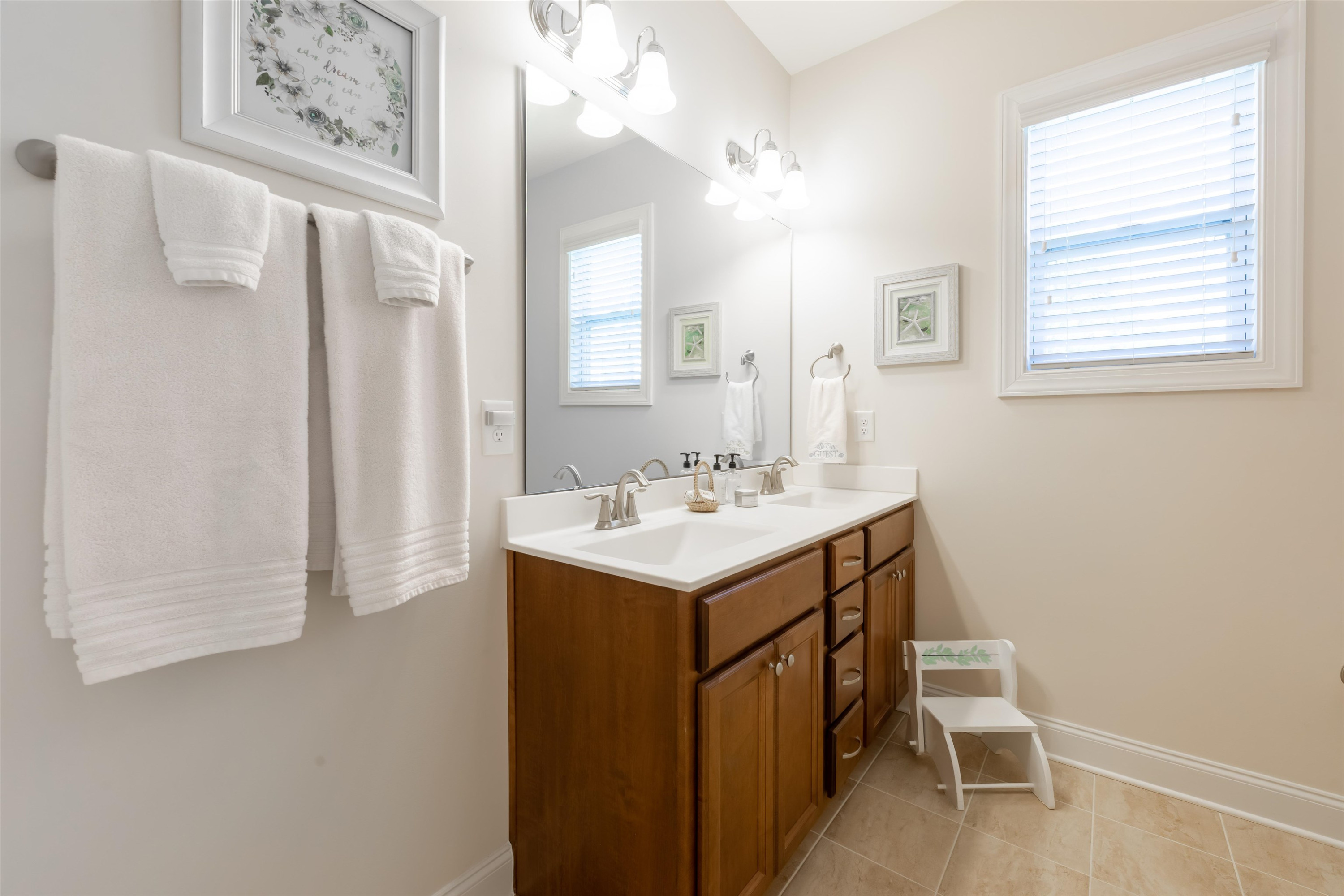 3537 Lavender Lane Wake Forest, NC 27587 - Photo 39 of 60 a bathroom with a sink a vanity and a mirror