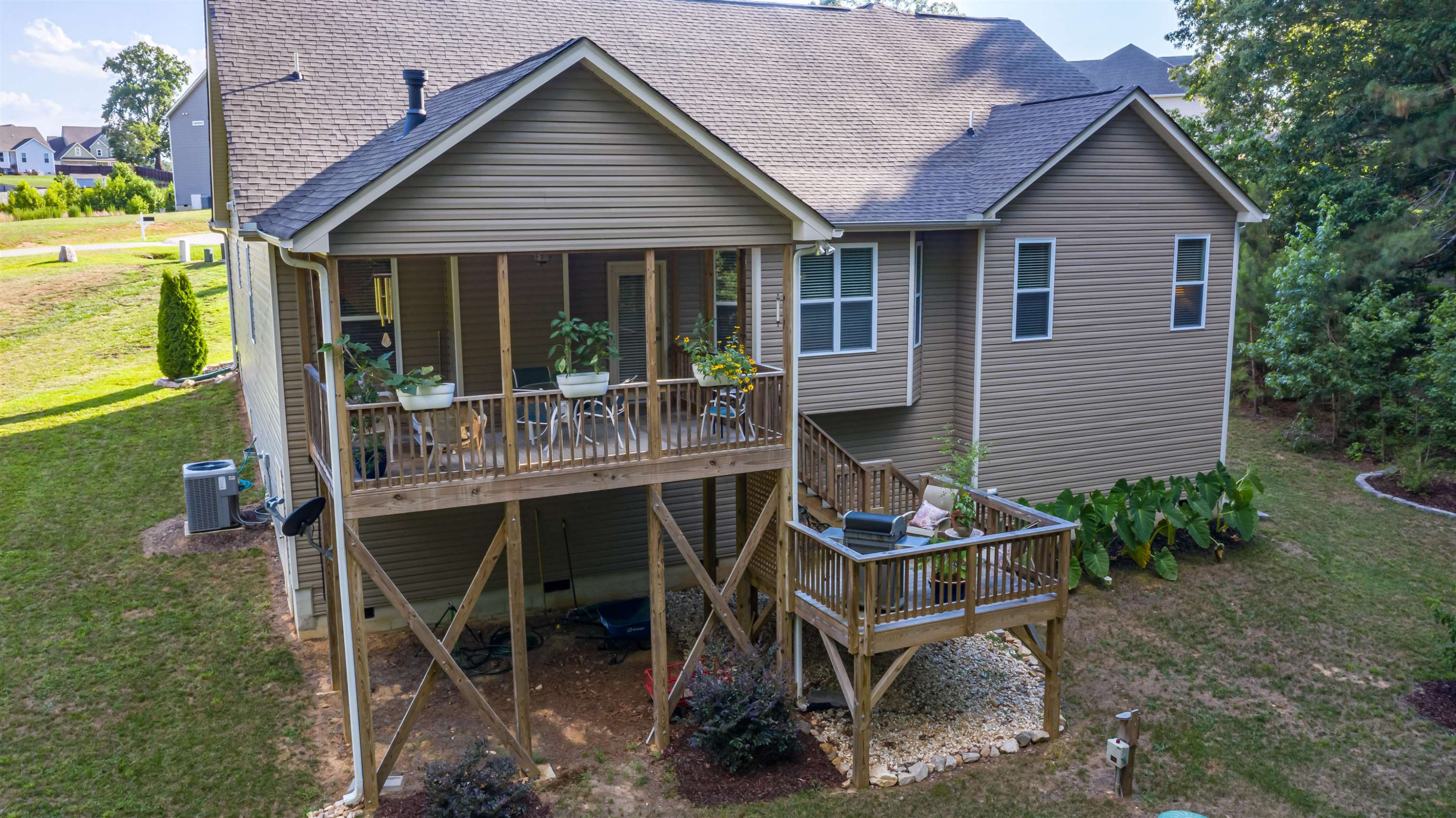 3537 Lavender Lane Wake Forest, NC 27587 - Photo 48 of 60 a backyard of a house with table and chairs
