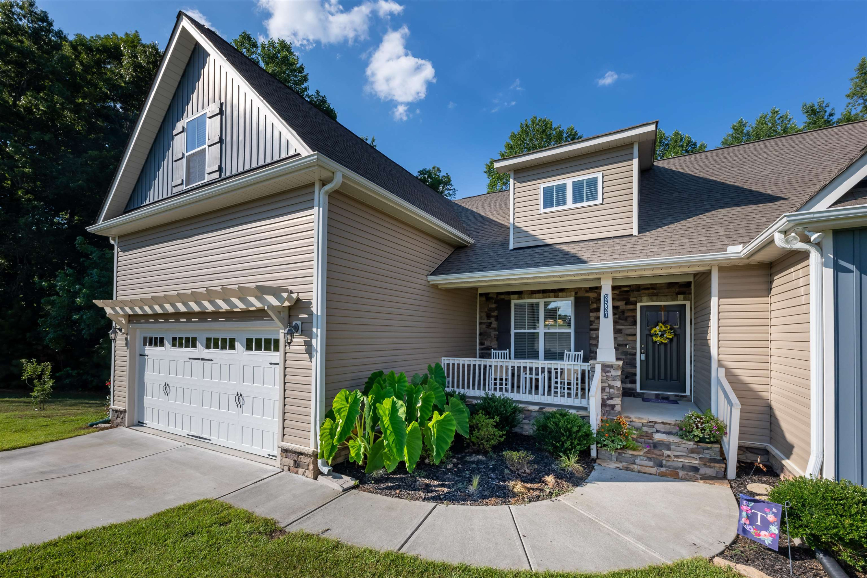 3537 Lavender Lane Wake Forest, NC 27587 - Photo 5 of 60 a front view of a house with garden