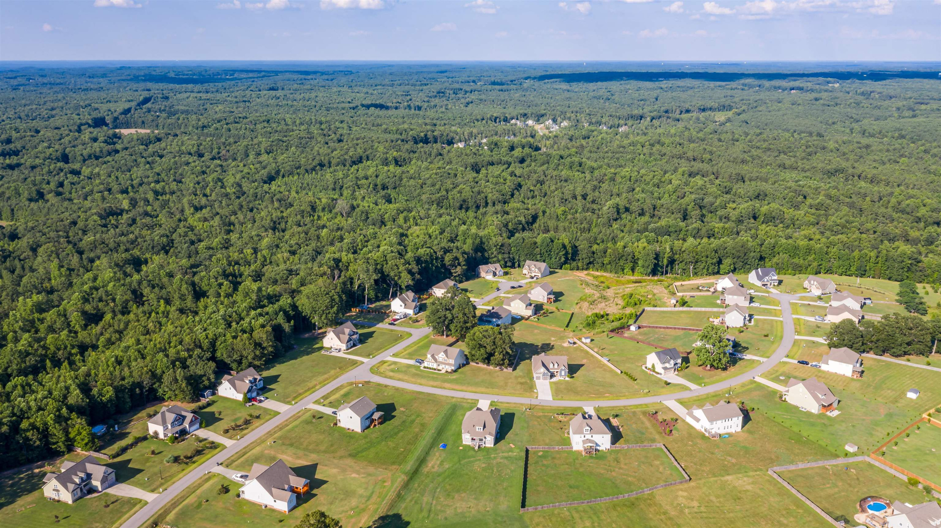 3537 Lavender Lane Wake Forest, NC 27587 - Photo 59 of 60 a view of a balcony with dining table and chairs