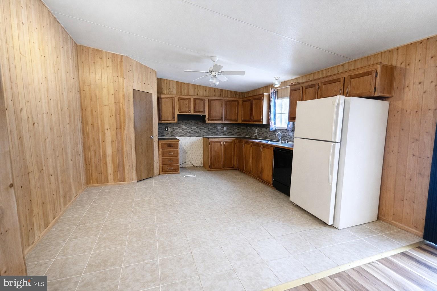 333 White Face Circle Zion Grove, PA 17985 - Photo 3 of 8 a kitchen with stainless steel appliances a refrigerator and a stove top oven