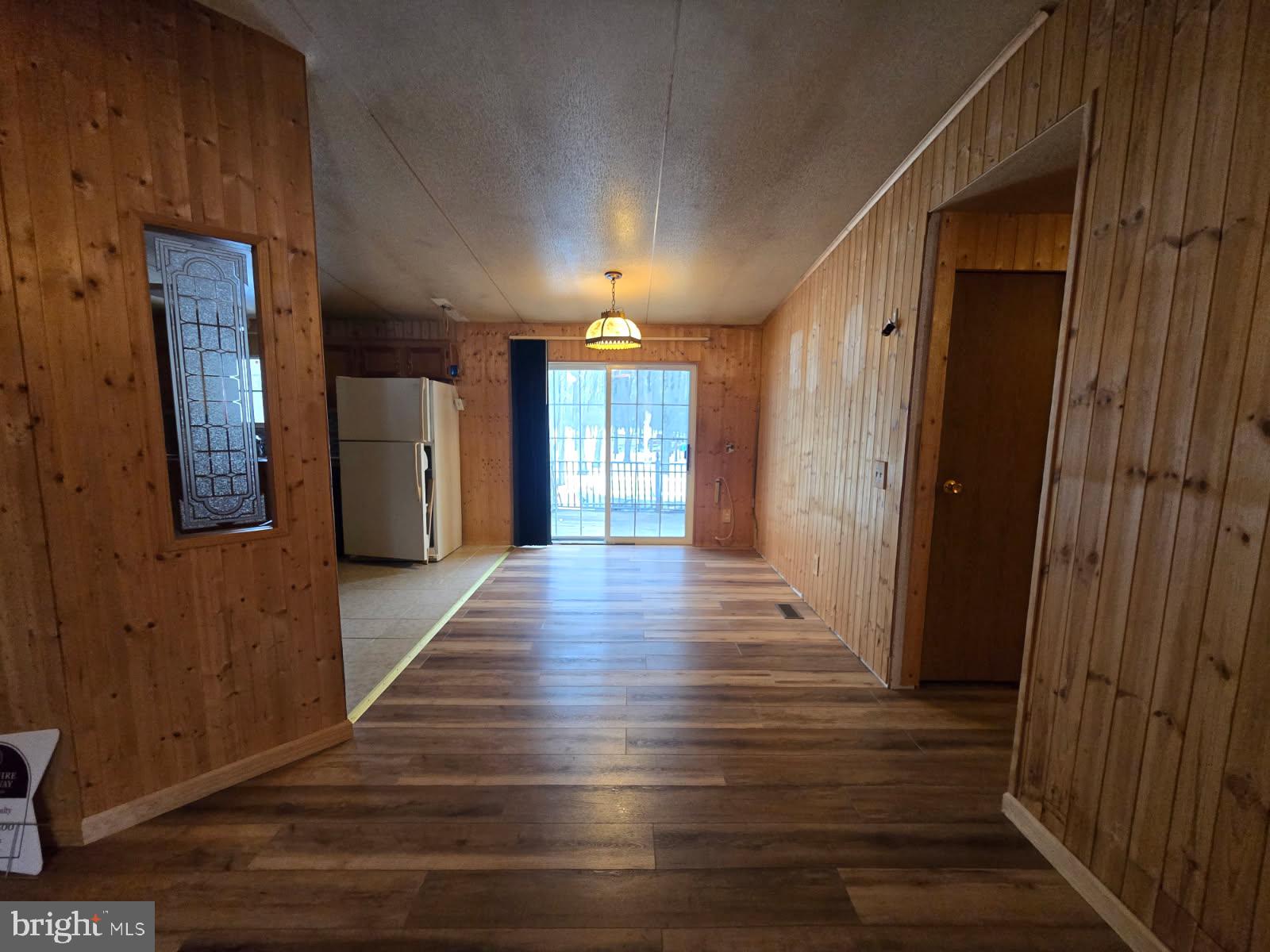 333 White Face Circle Zion Grove, PA 17985 - Photo 4 of 8 a view of a hallway with wooden floor and staircase