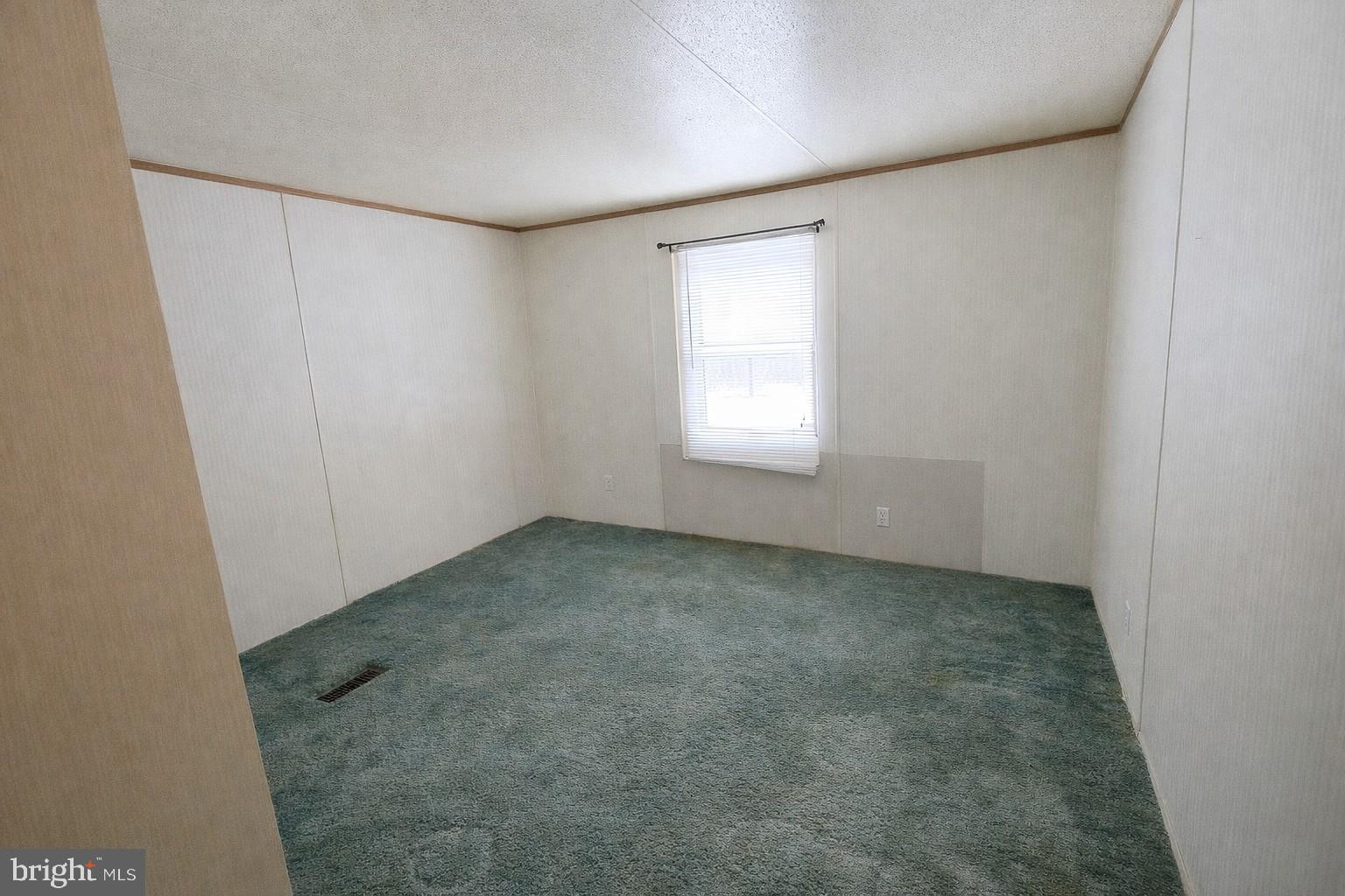333 White Face Circle Zion Grove, PA 17985 - Photo 6 of 8 an empty room with windows