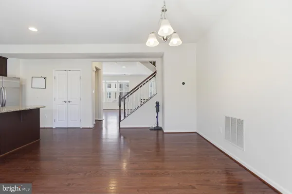 a view of entryway with wooden floor