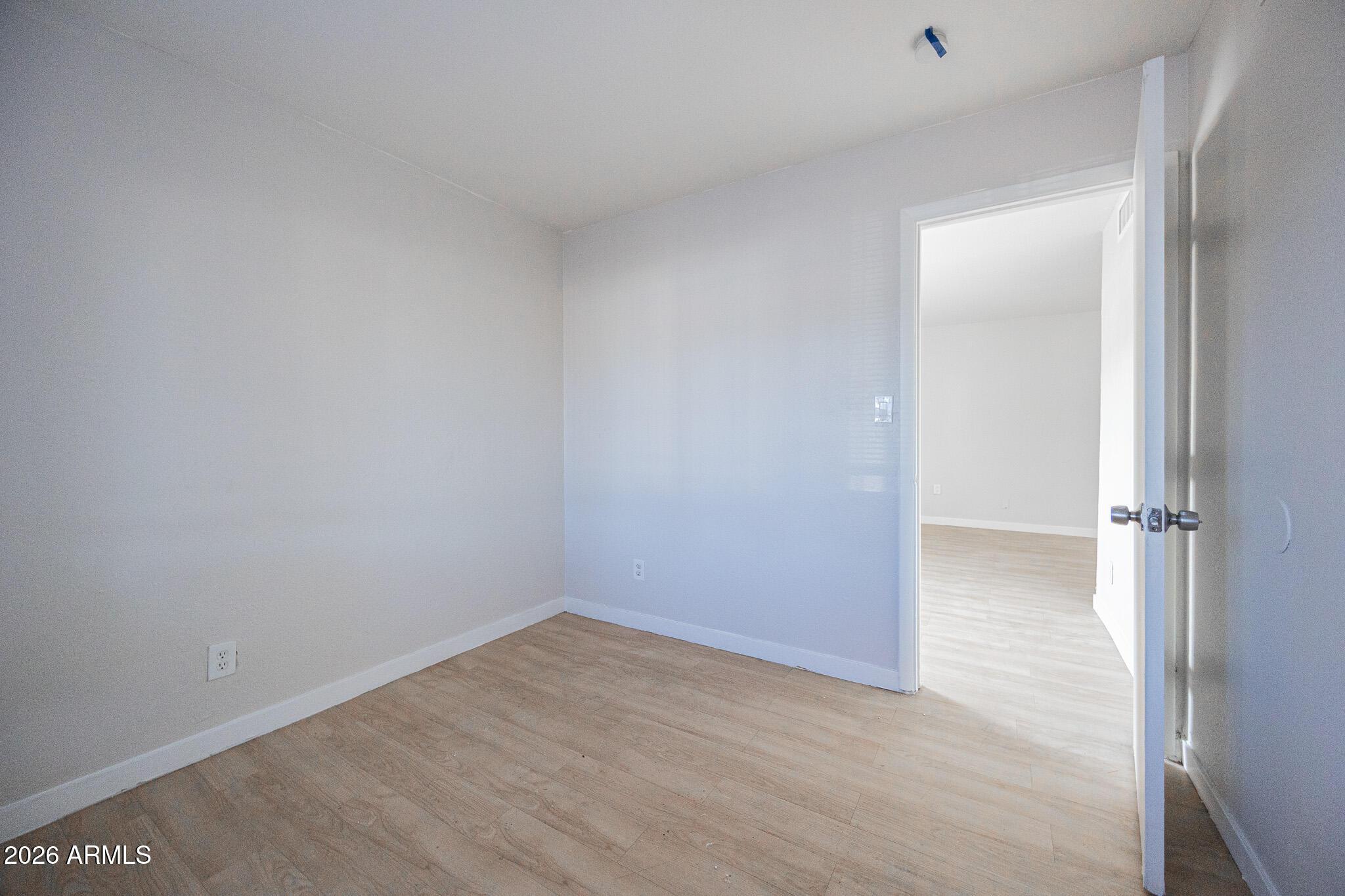 1703 West Mountain View Road, Unit 4 Phoenix, AZ 85021 - Photo 13 of 13 a view of an empty room