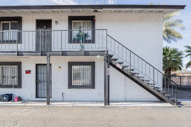 a view of a kitchen with a stove cabinets and wooden floor