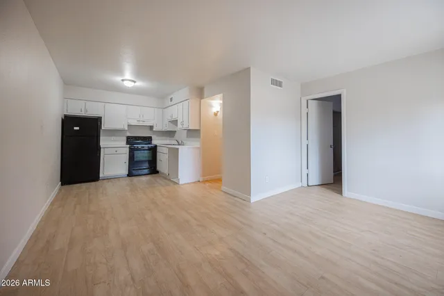 an empty room with windows