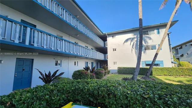 a view of balcony with furniture