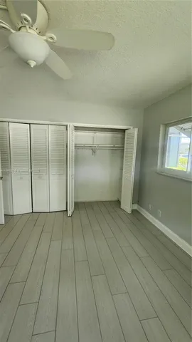 a bathroom with a shower and a toilet