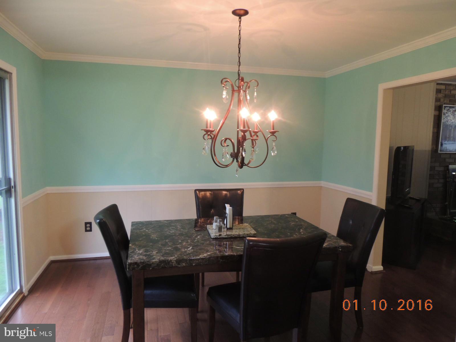 1130 Sturbridge Road Fallston, MD 21047 - Photo 12 of 29 a view of a dining room with furniture and wooden floor