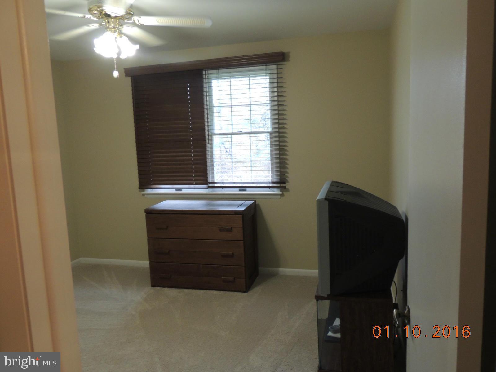 1130 Sturbridge Road Fallston, MD 21047 - Photo 14 of 29 a bathroom with a sink and a mirror