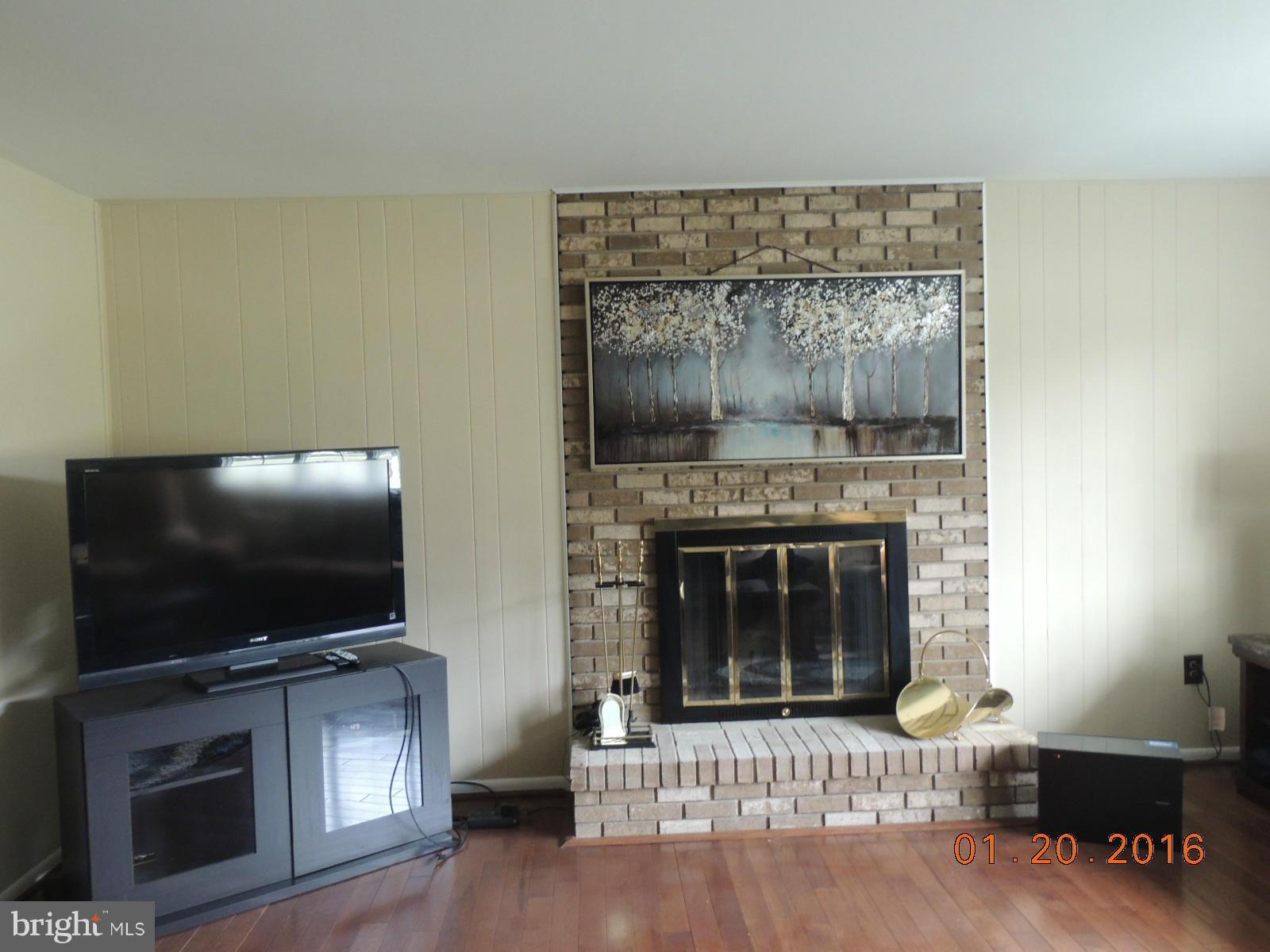 1130 Sturbridge Road Fallston, MD 21047 - Photo 18 of 29 a living room with furniture and a flat screen tv