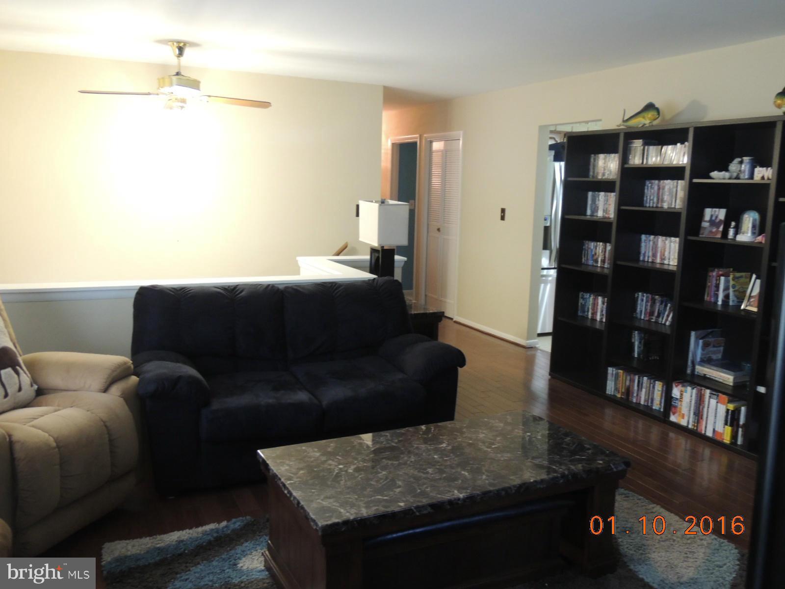 1130 Sturbridge Road Fallston, MD 21047 - Photo 19 of 29 a living room with furniture and a couch