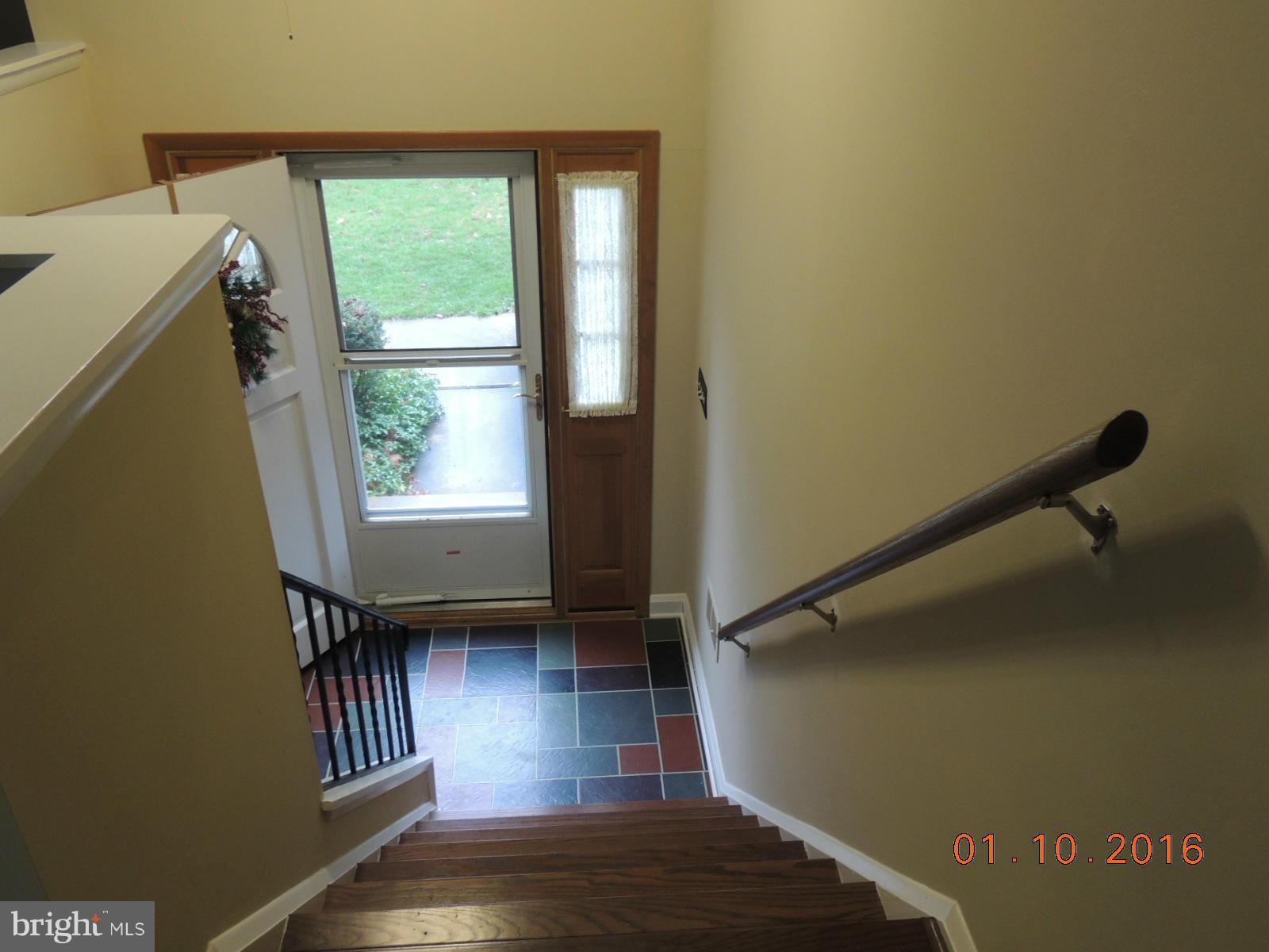 1130 Sturbridge Road Fallston, MD 21047 - Photo 20 of 29 a view of a hallway with wooden floor and a window