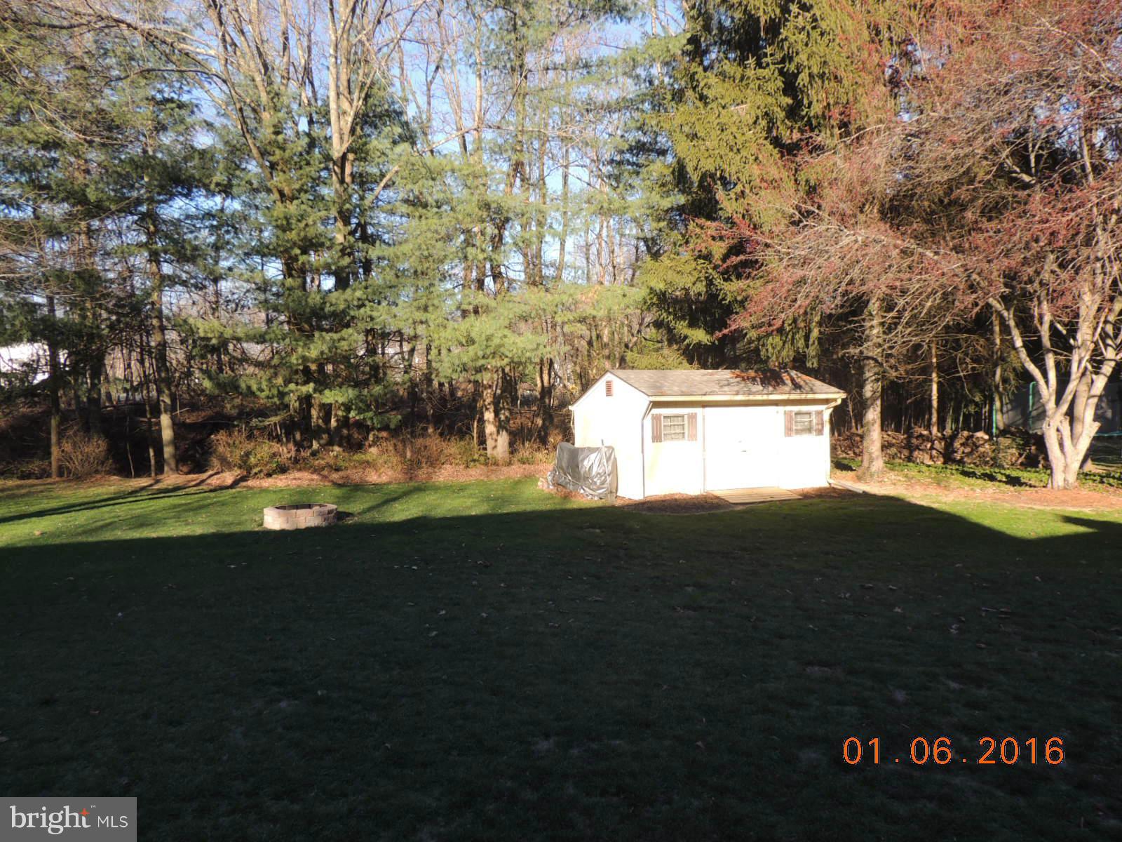 1130 Sturbridge Road Fallston, MD 21047 - Photo 3 of 29 a view of back yard of the house and green space
