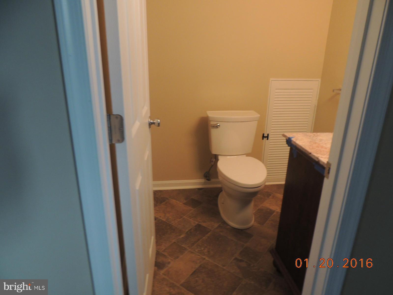 1130 Sturbridge Road Fallston, MD 21047 - Photo 27 of 29 a white toilet sitting next to a sink