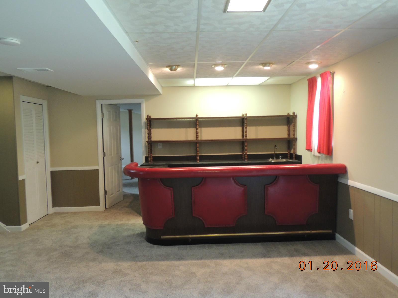 1130 Sturbridge Road Fallston, MD 21047 - Photo 28 of 29 a room with wooden cabinets