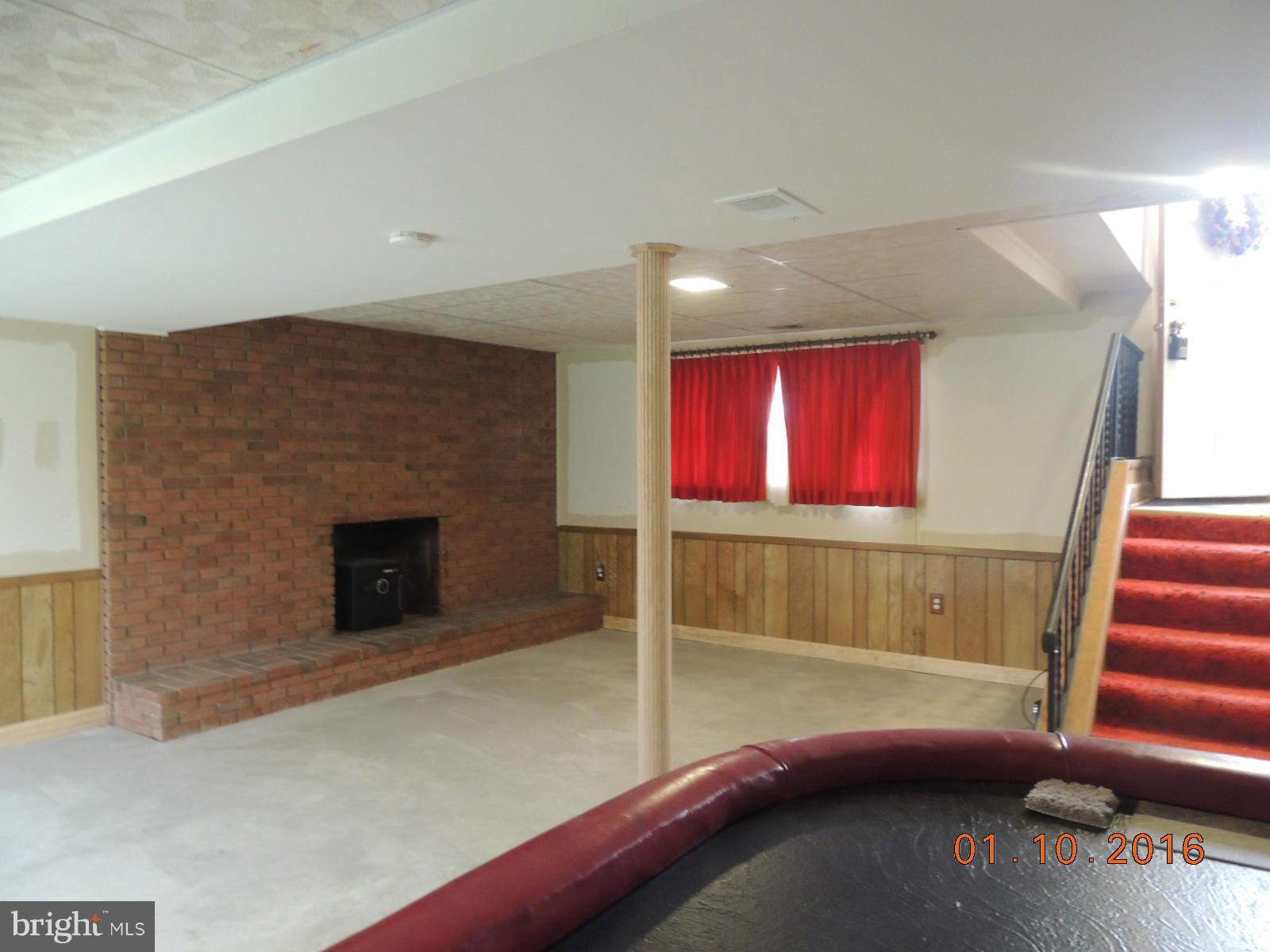 1130 Sturbridge Road Fallston, MD 21047 - Photo 29 of 29 a view of a livingroom with wooden floor and fireplace